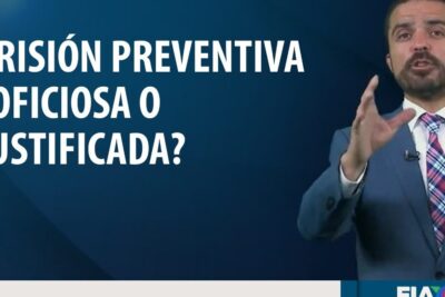 Male presenter in a suit beside a large Spanish headline about prision preventiva 1 questioning whether preventive detention is officious or justified.