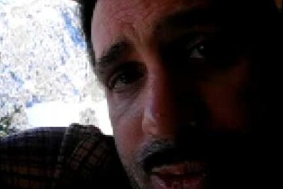 Close-up of a man's face in shadow by a window illustrating pubblicita etica.