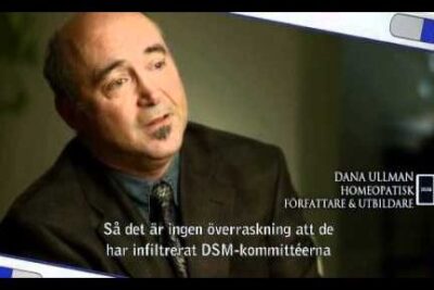 Close-up of a professional man in a suit during an interview discussing rattfardigar medlen