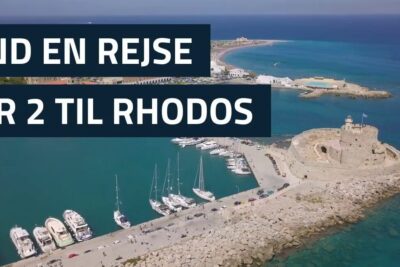 Aerial view of turquoise harbor, yachts and a historic seaside fort perfect for rejse vinden