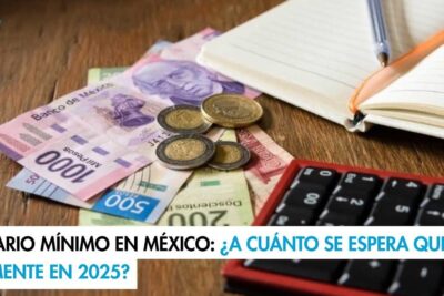 Mexican banknotes, coins, calculator and open notebook laid out for salary calculation related to salario minimo 2.