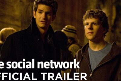 Two young men stand in a dimly lit crowd with bold text overlay promoting social network 9.