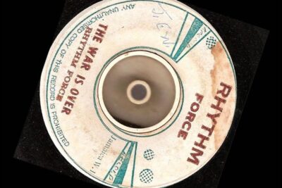 Worn Rhythm Force 45 vinyl label reading 'The War Is Over' with syn pa 4