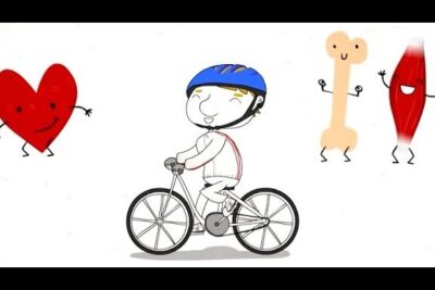 Cartoon rider wearing a helmet on a bicycle surrounded by smiling heart, bone, and muscle characters advocating uso bicicleta.