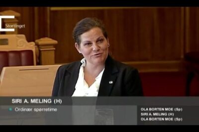 Person speaking in a parliamentary chamber suitable for utvinning skifergass coverage