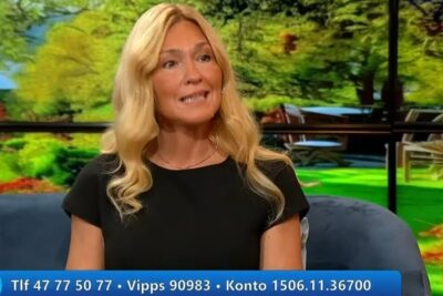 Female guest seated in a TV studio interview about valgfri stemmerett