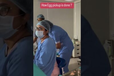 Medical staff in scrubs, masks and caps preparing for an egg retrieval procedure vitro befrugtning 1