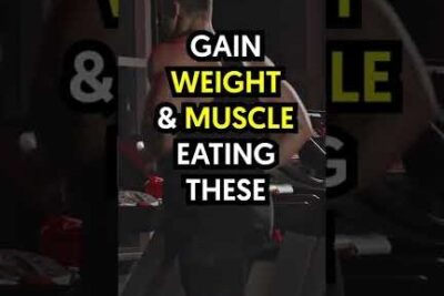 Man lifting weights in a gym with bold overlay text promoting weight gain 1 and muscle-building nutrition.