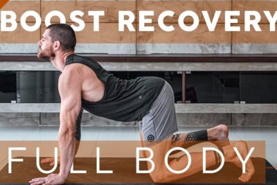 Man performing a full-body recovery stretch on a mat in cow pose yoga sport 3.